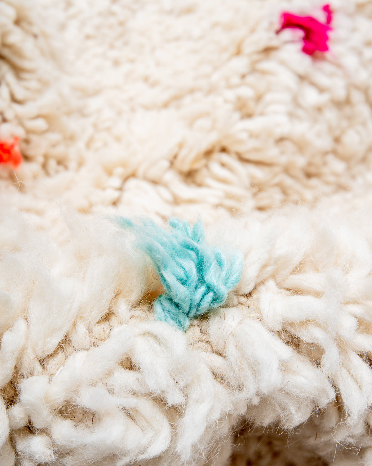Modern, designer, handcrafted Berber rug from Morocco. Beniourain carpet with beautiful colours and patterns and fluffy wool texture.